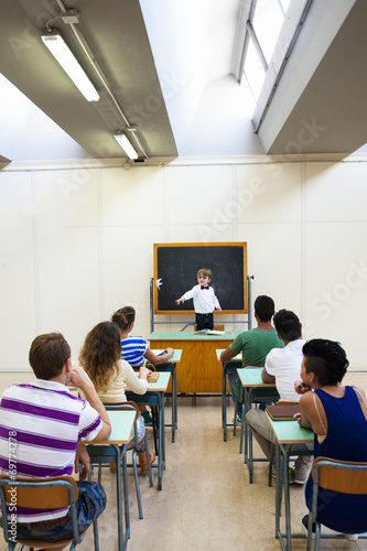 Students at school with little teacher © tecnofotocr