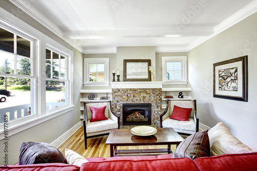 Cozy small living room with fireplace.