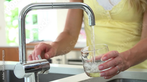 Slow Motion Sequence Of Getting Drink Of Water From Tap