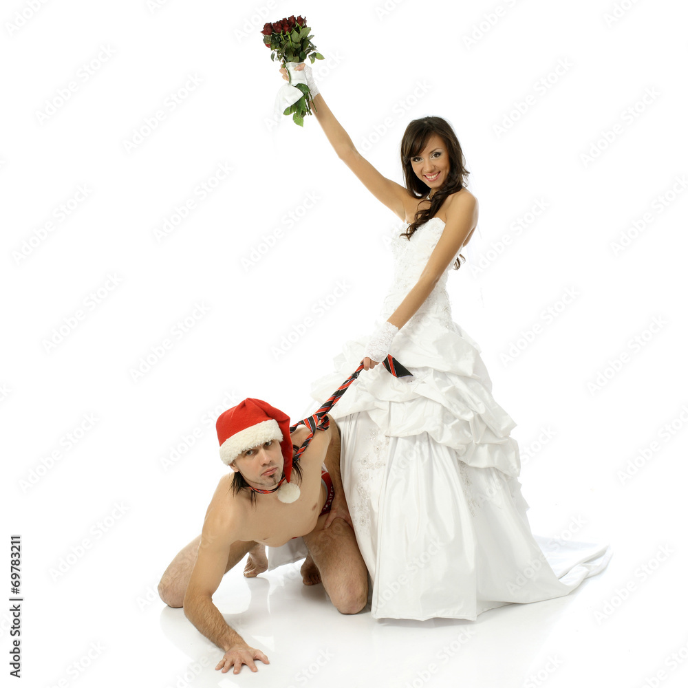 Girl in a wedding dress holding a naked man for a tie Stock Photo | Adobe  Stock