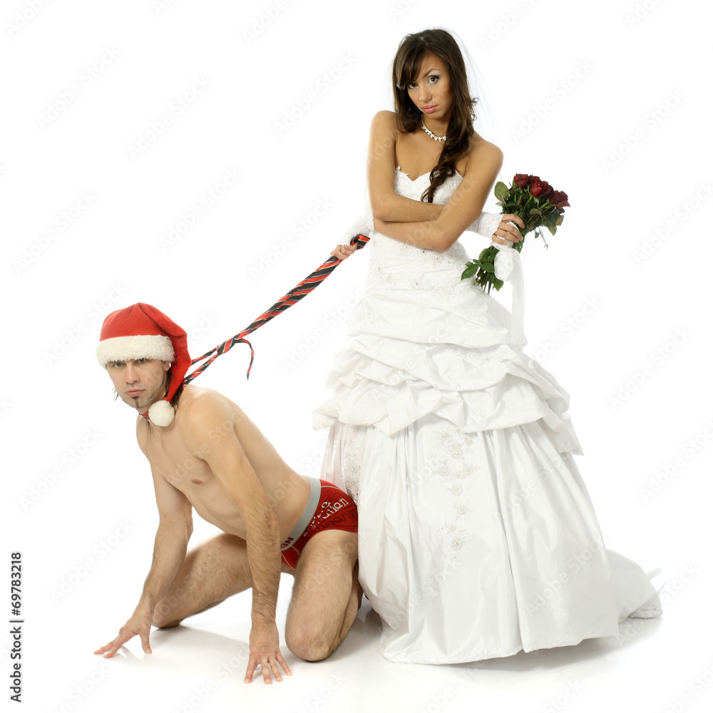 Girl in a wedding dress holding a naked man for a tie Stock Photo | Adobe  Stock