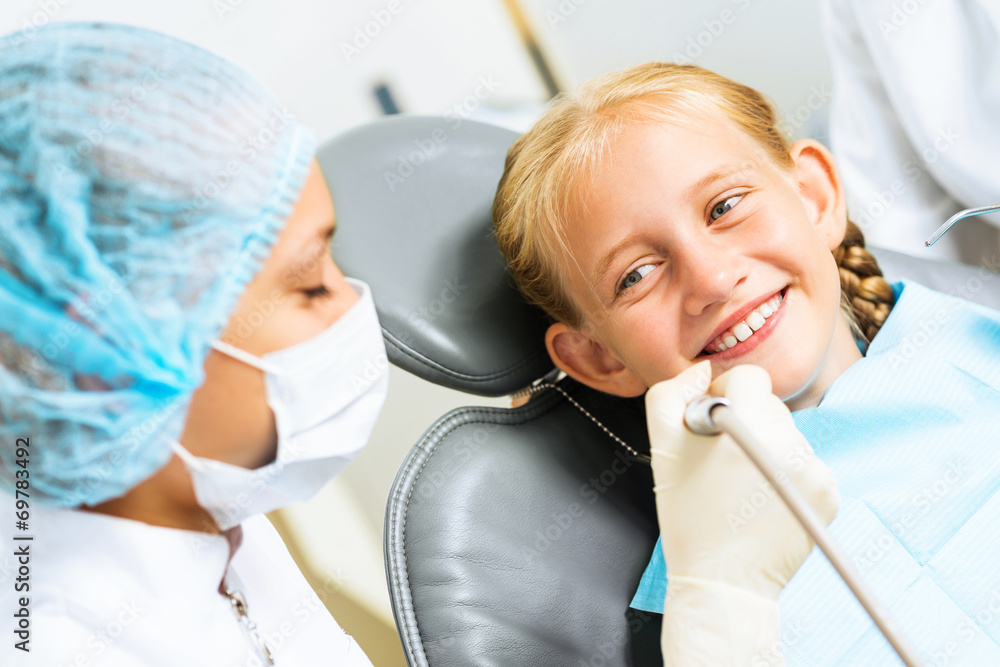 Dentist inspecting patient Dentist inspecting patient