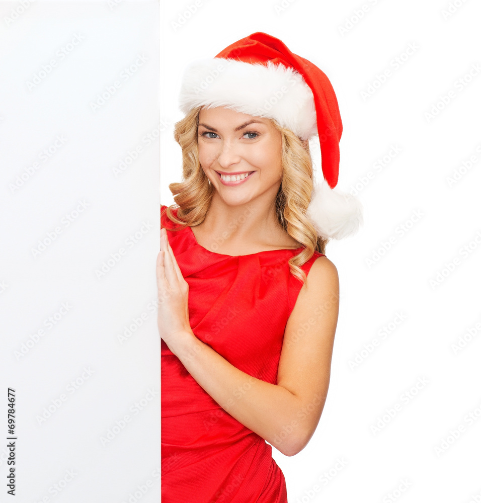 woman in santa helper hat with blank white board woman in santa helper hat with blank white board