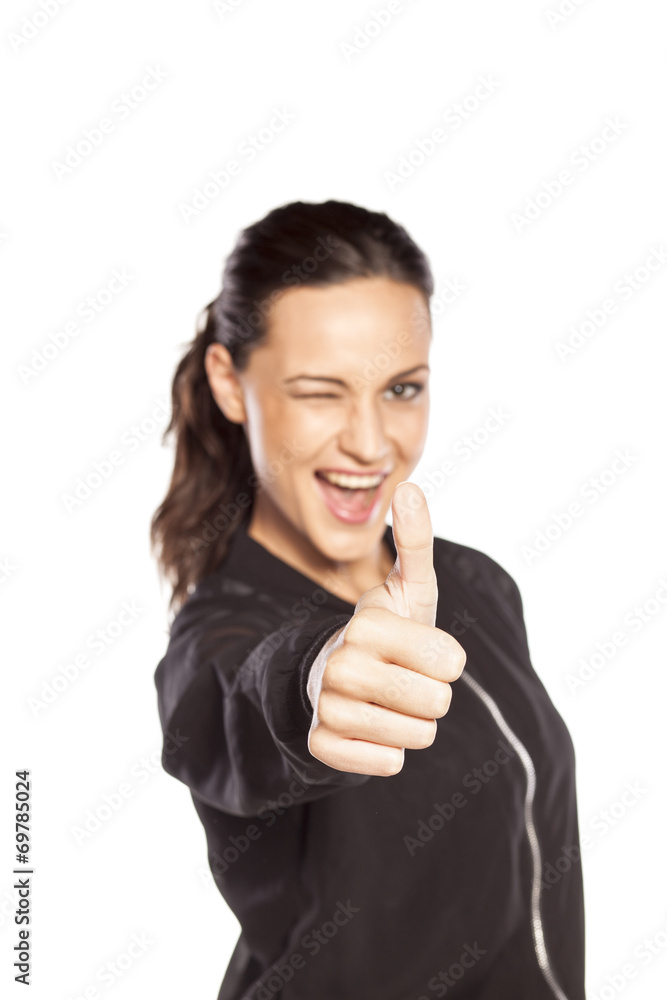happy young woman with thumb up on white background happy young woman with thumb up on white background