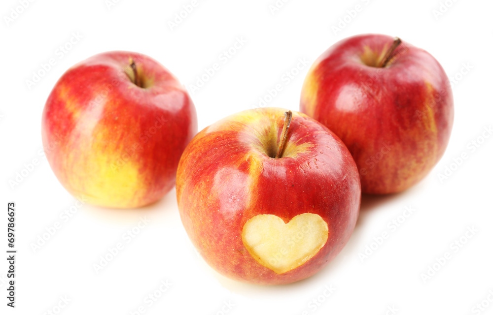 Red apple with heart isolated on white Red apple with heart isolated on white