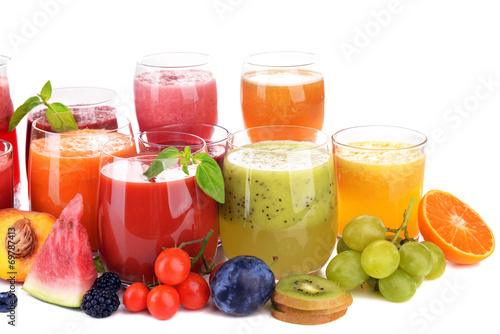 Glasses of tasty fresh juice, isolated on white