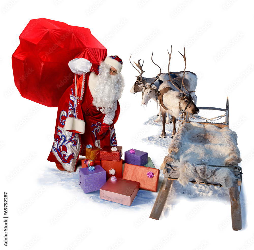 Santa Claus with big bag of gifts and his reindeer sleigh Stock Photo ...