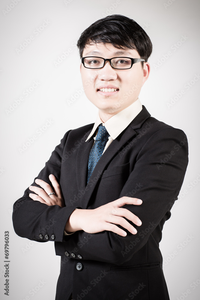 Successful young business man of Asian, full length portrait iso Successful young business man of Asian, full length portrait iso