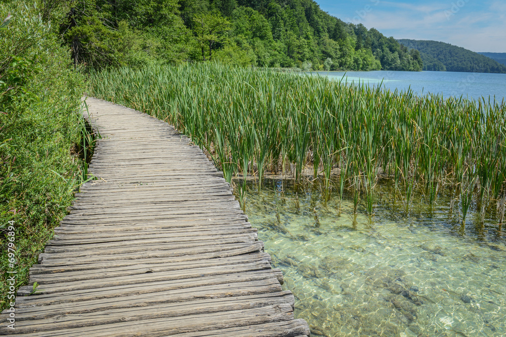 Wooden Bridge over a Lake in Plitvice National Park