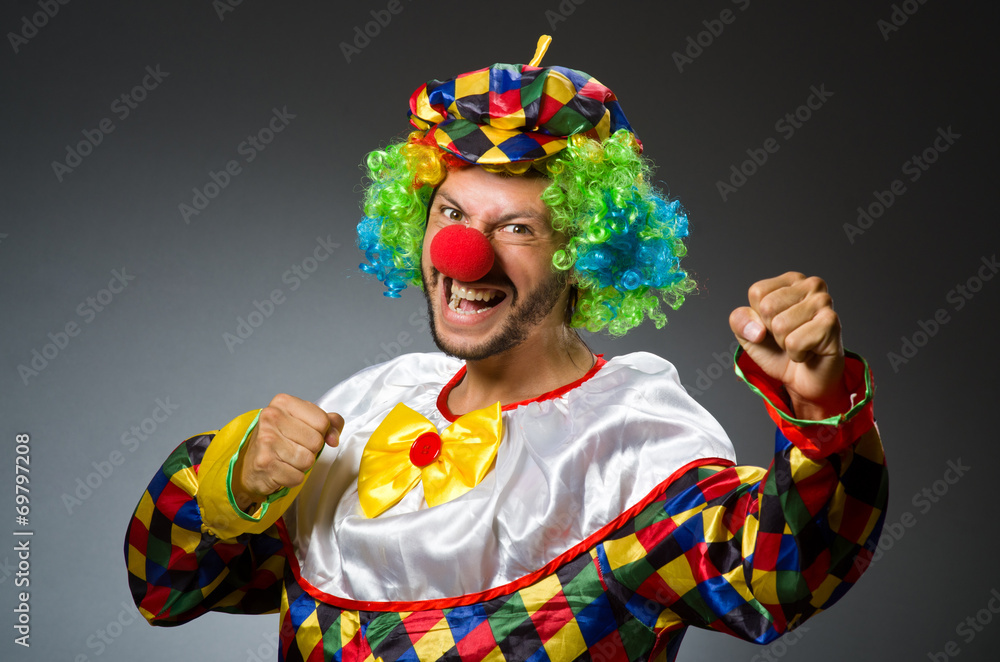 Funny clown in colourful costume Funny clown in colourful costume