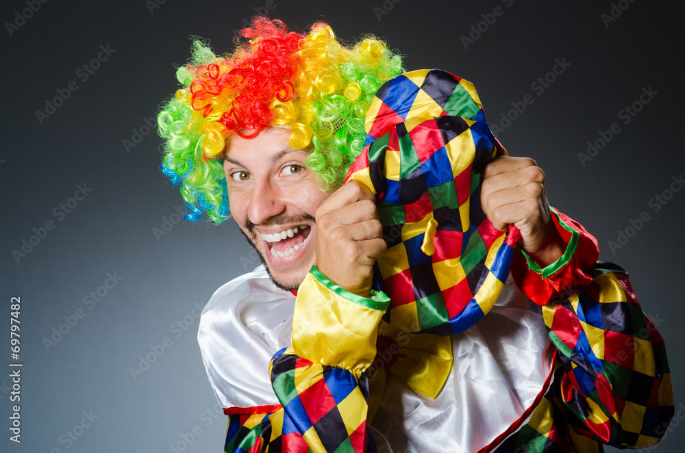 Funny clown in colourful costume Funny clown in colourful costume