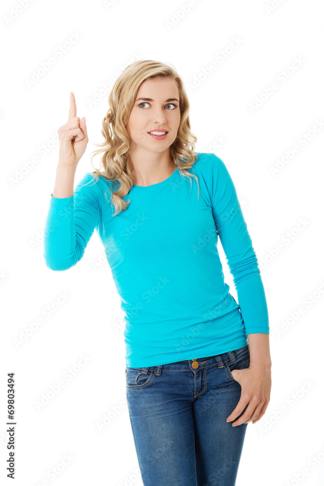 Casual woman presenting a copyspace. Casual woman presenting a copyspace.