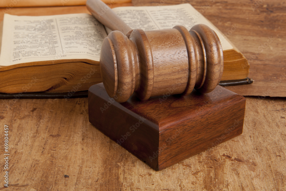 Wooden gavel and books