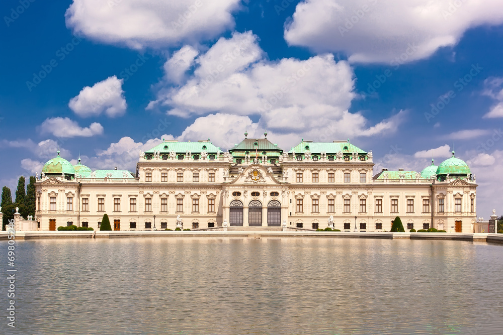 Belvedere palace is reflected in fountain water, Vienna, Austria