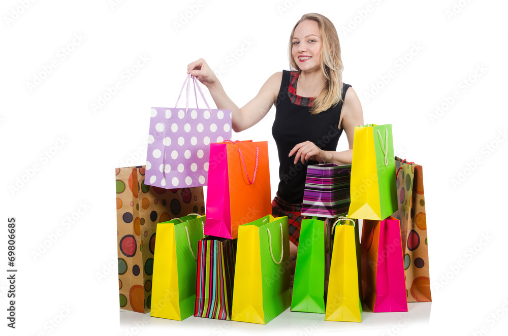 Young woman after shopping isolated on the white Young woman after shopping isolated on the white