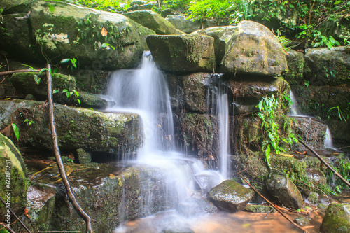 waterfall and rocks covered with moss