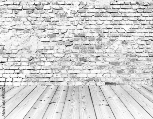 Old brick wall on wood floor