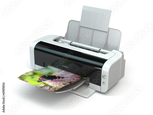 Color printer prints photo on white isolated background. photo