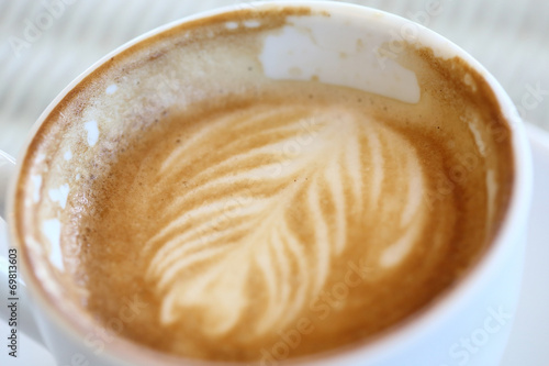 coffee on white table in cafe