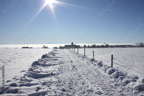 Sonne   ber Schneelandschaft