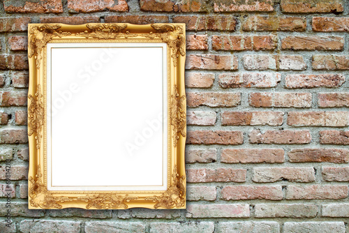 blank golden frame on brick stone wall © geargodz
