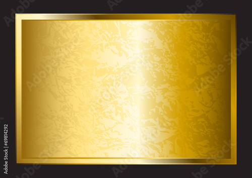 A gold plate isolated on black background