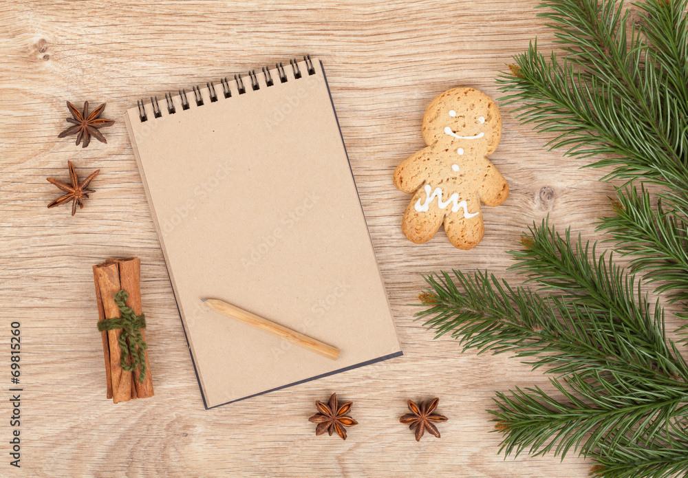 Christmas fir tree, gingerbrean man and blank notepad Christmas fir tree, gingerbrean man and blank notepad