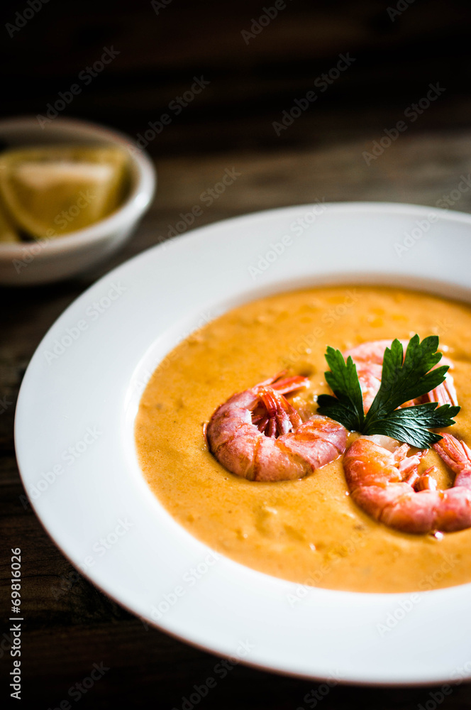 Shrimp soup with mussels on rustic background Shrimp soup with mussels on rustic background