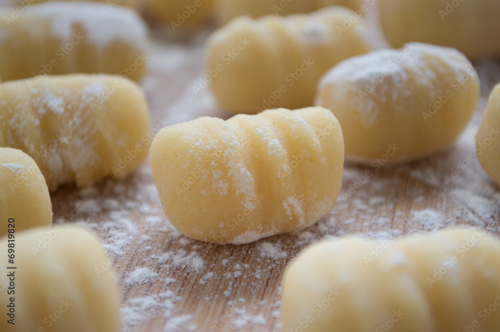 Gnocchi uncooked on wood Gnocchi uncooked on wood