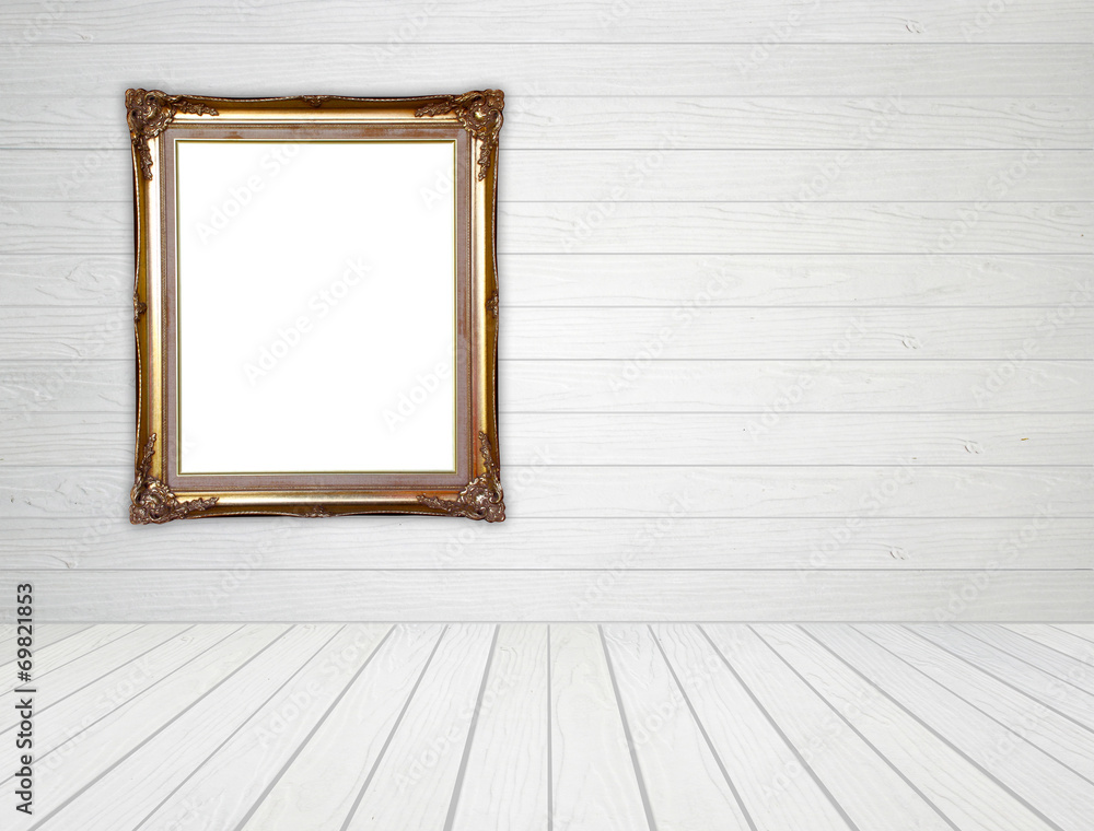 blank golden frame in room with white wood wall and wood floor blank golden frame in room with white wood wall and wood floor