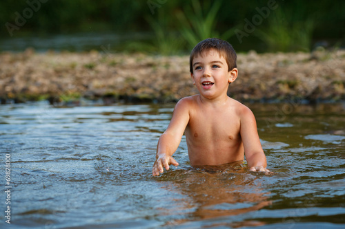 A child plays in the water