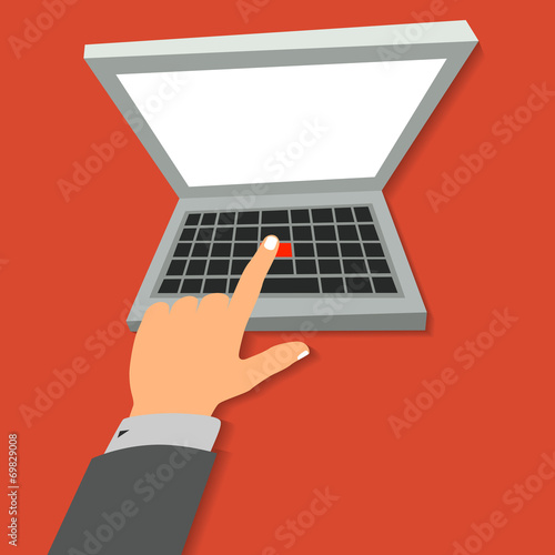 The hand presses the red button on laptop.
