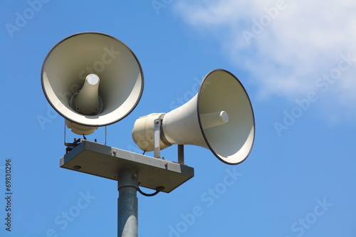 Speaker on high tower and nice blue sky