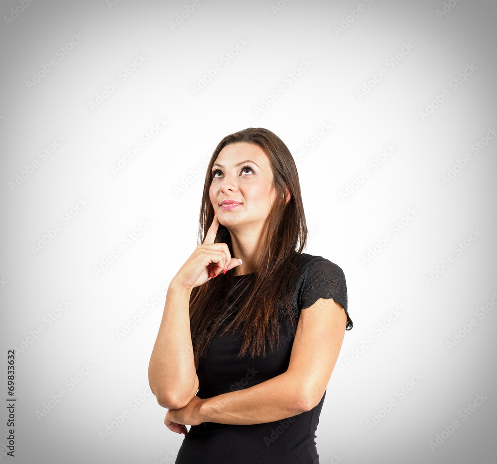 Thoughtful woman portrait on vignette background Thoughtful woman portrait on vignette background
