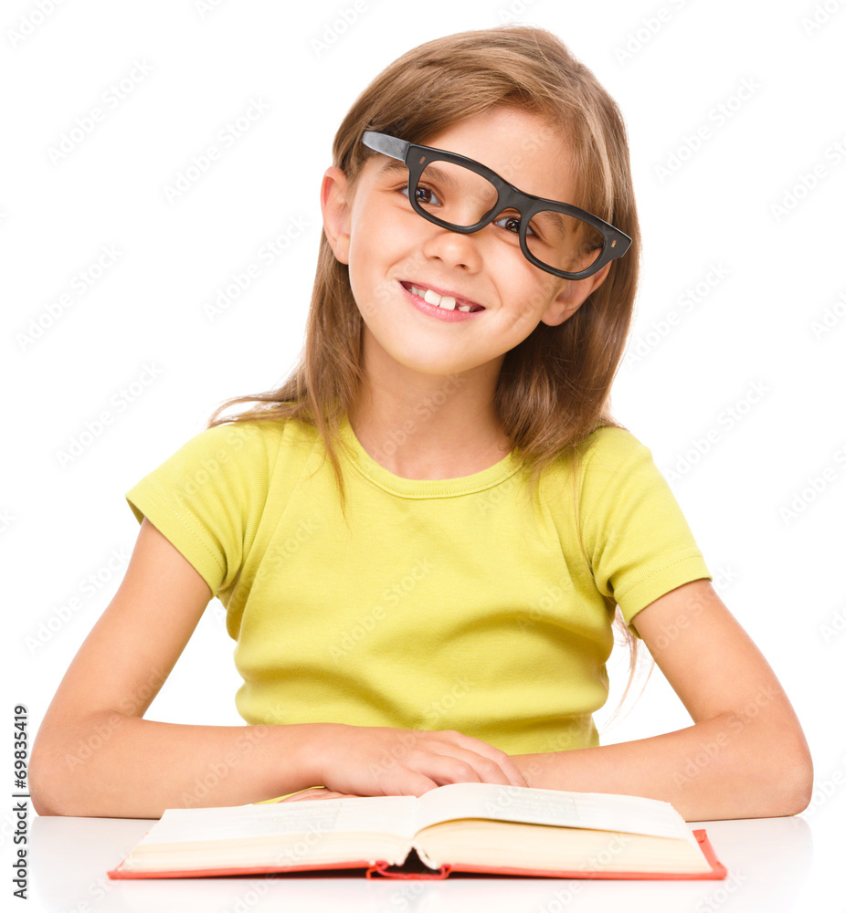 Little girl is reading a book Little girl is reading a book