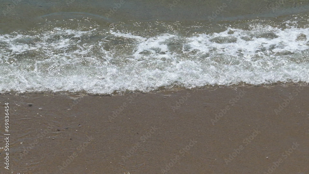 Waves Crashing on Beach, calm weather Waves Crashing on Beach, calm weather
