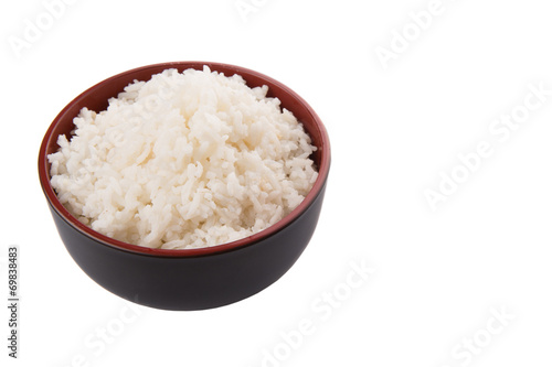 A bowl of rice over white background 