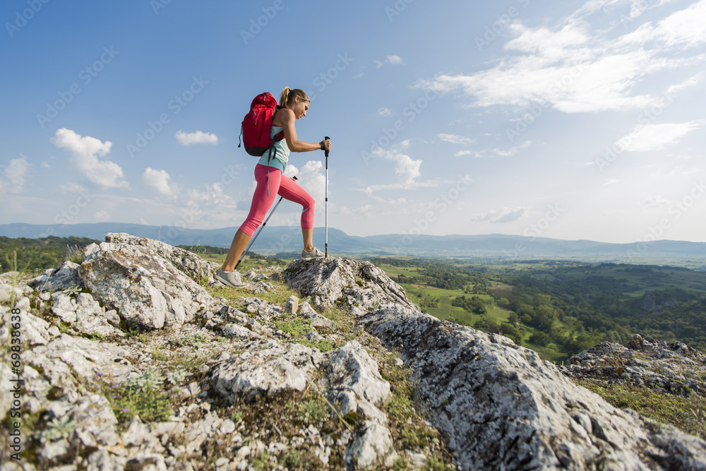 Young woman hiking on the mountain