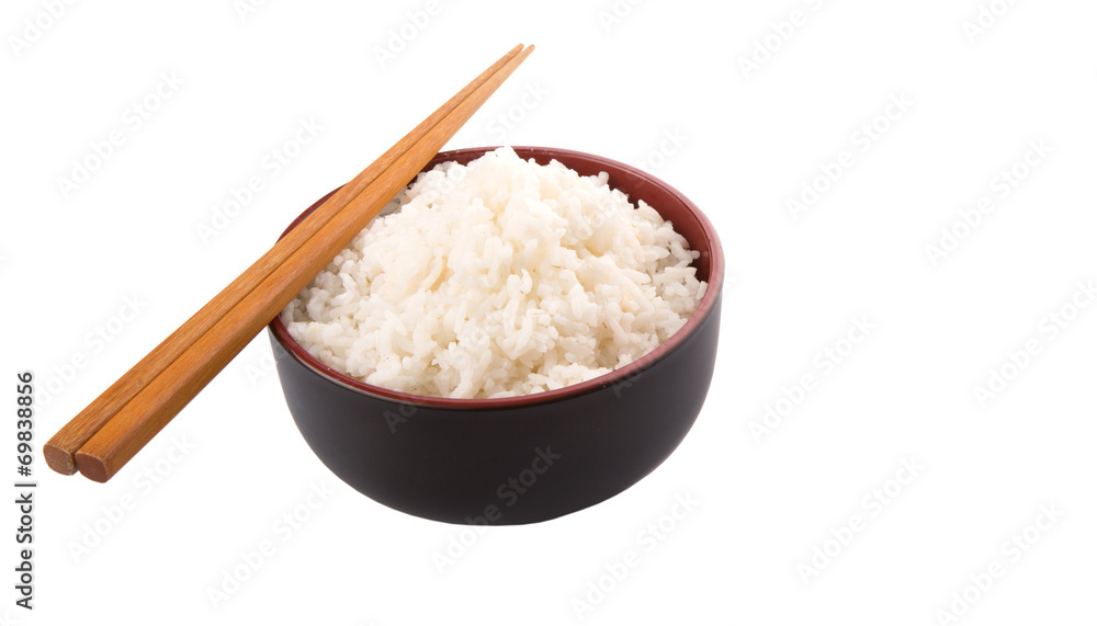 A bowl of rice and a pair of chopstick over white background A bowl of rice and a pair of chopstick over white background