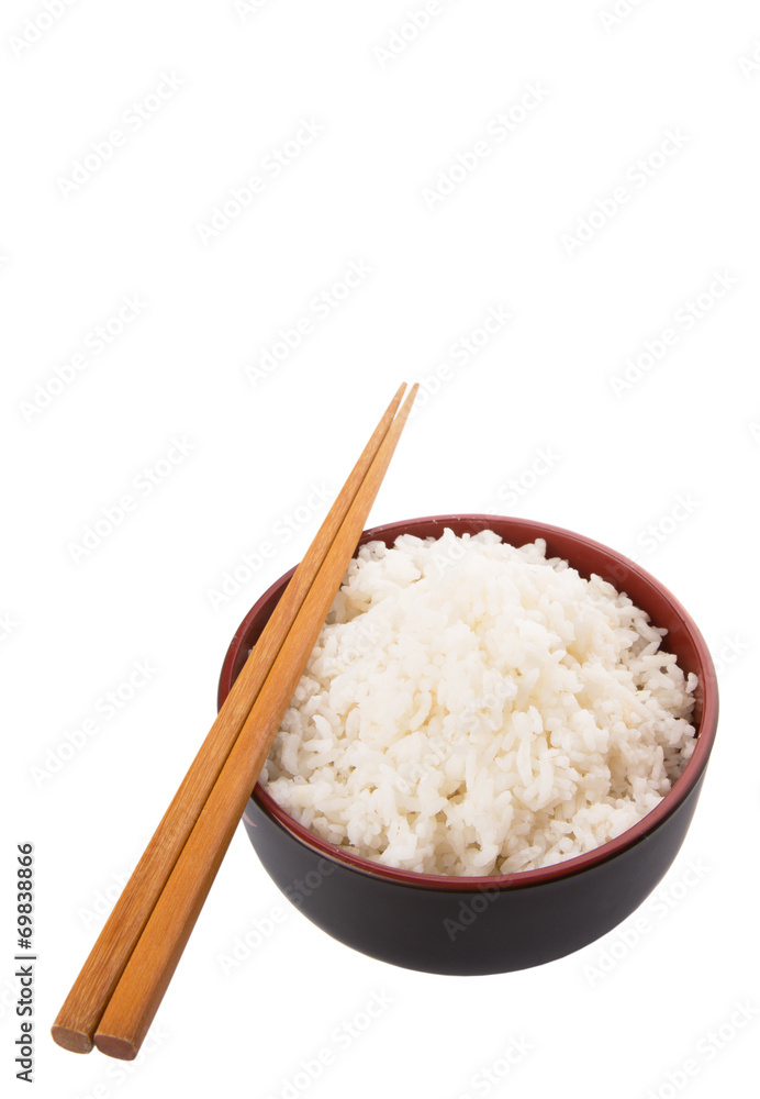 A bowl of rice and a pair of chopstick over white background A bowl of rice and a pair of chopstick over white background