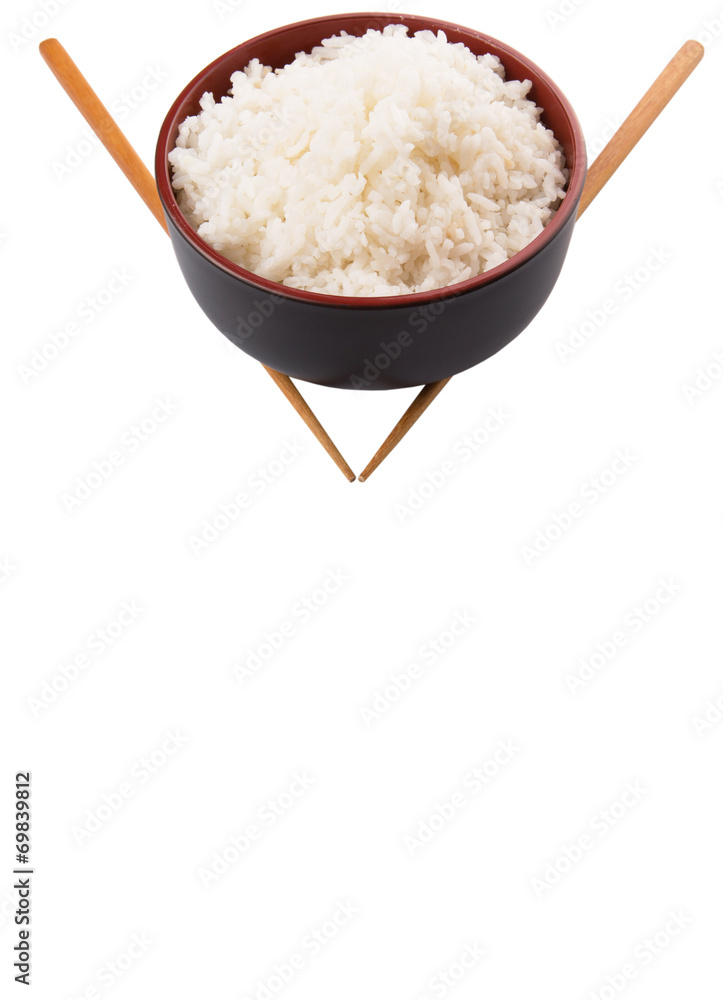 A bowl of rice and a pair of chopstick over white background A bowl of rice and a pair of chopstick over white background