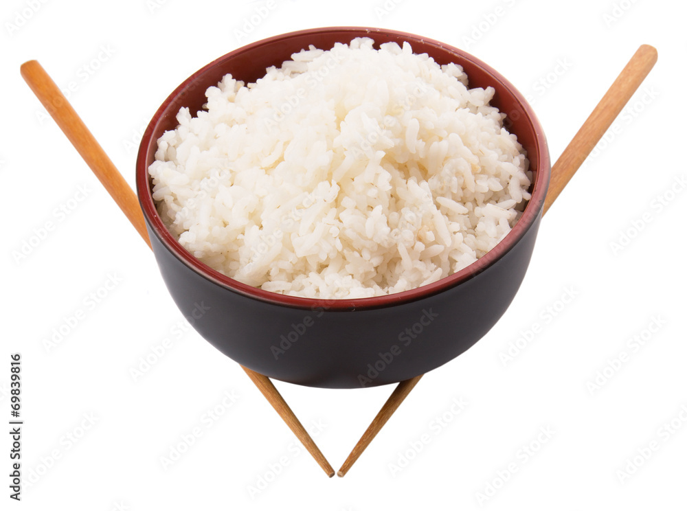 A bowl of rice and a pair of chopstick over white background A bowl of rice and a pair of chopstick over white background