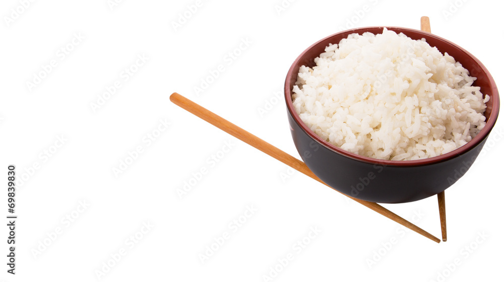 A bowl of rice and a pair of chopstick over white background A bowl of rice and a pair of chopstick over white background