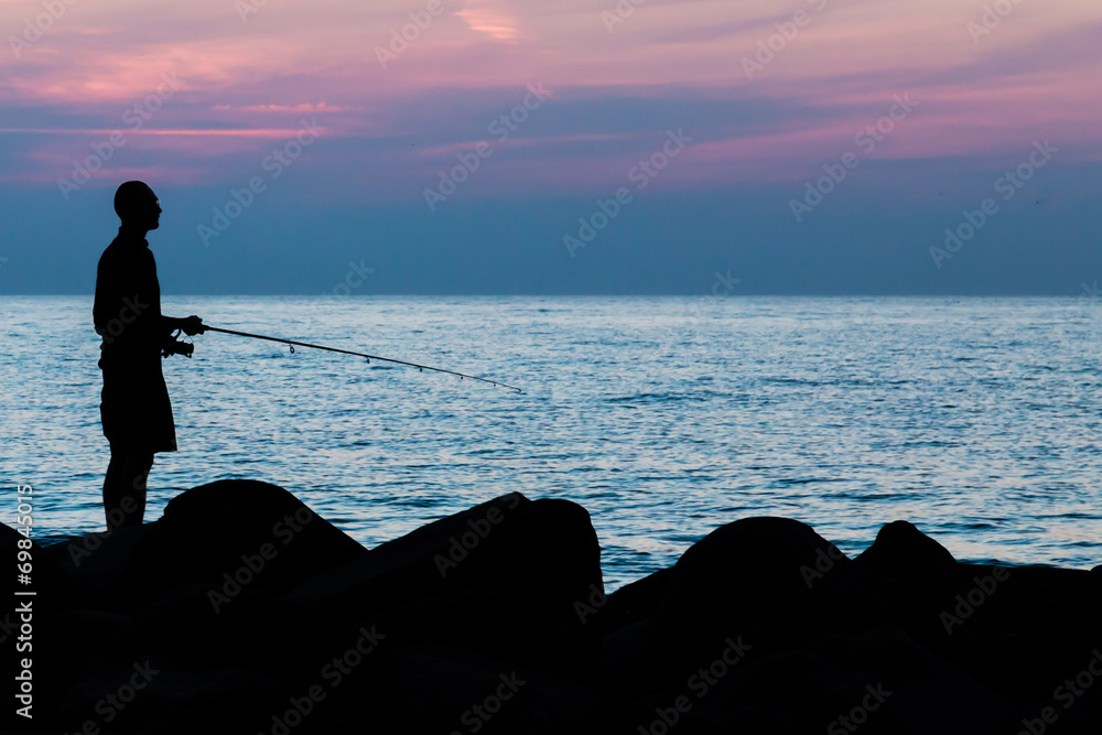 Fisherman waiting for the catch