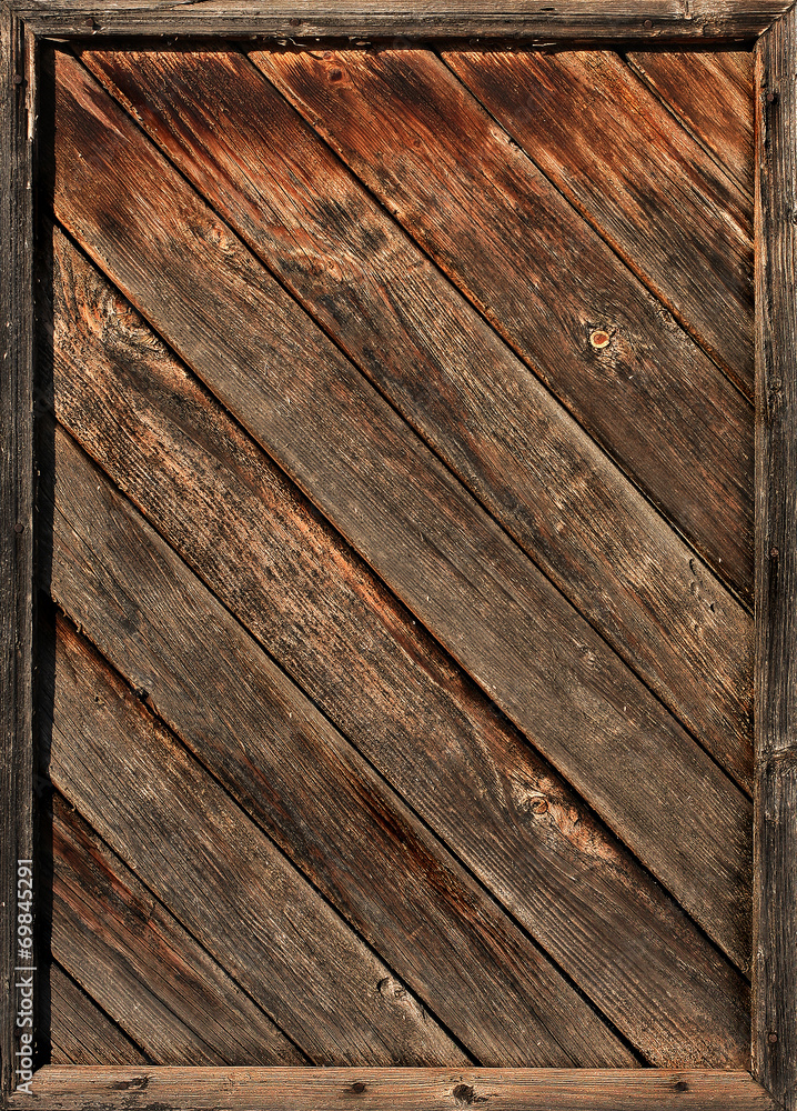 Fototapeta premium Old wooden diagonal laths in framework