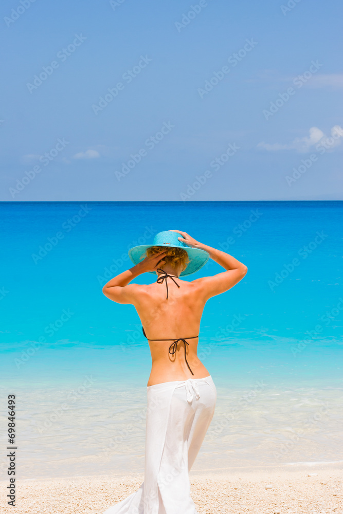 Beautiful young sexy woman by the sea in Greece Beautiful young sexy woman by the sea in Greece