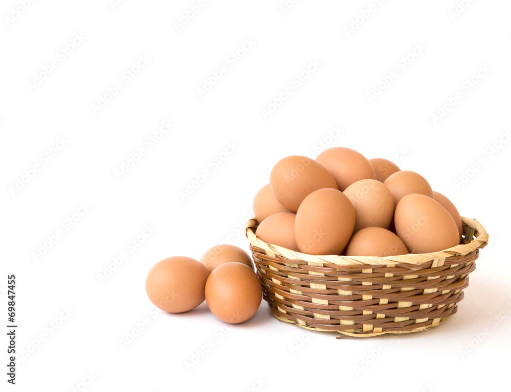 egg in basket wicker on white background