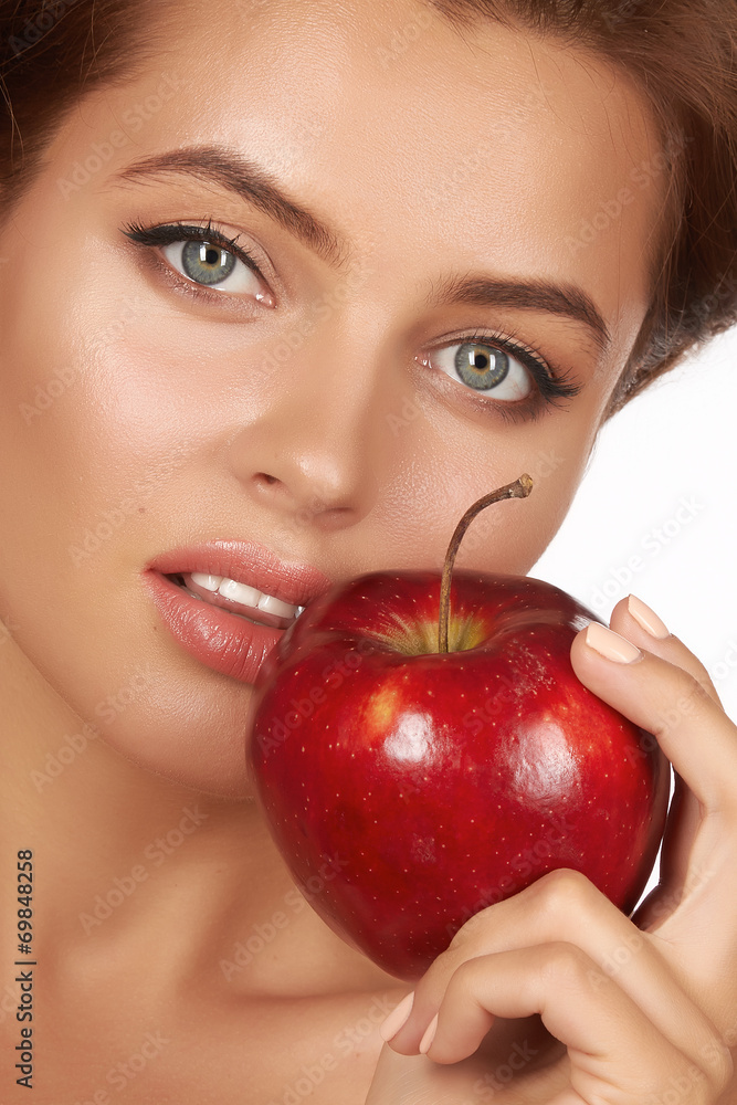 Sexy girl holding big red apple to enjoy the taste smile, teeth Sexy girl holding big red apple to enjoy the taste smile, teeth