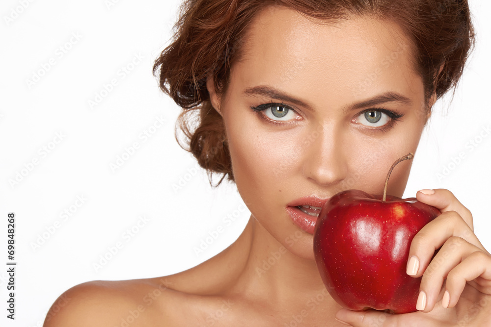 Sexy girl holding big red apple to enjoy the taste smile, teeth Sexy girl holding big red apple to enjoy the taste smile, teeth