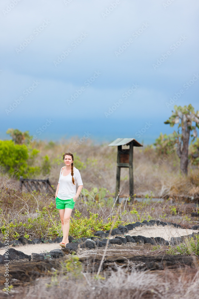 Young woman hiking at Galapagos islands